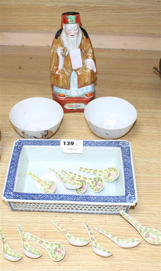 A Chinese plant stand, a Chinese figure of an immortal, 12 spoons and 2 bowls